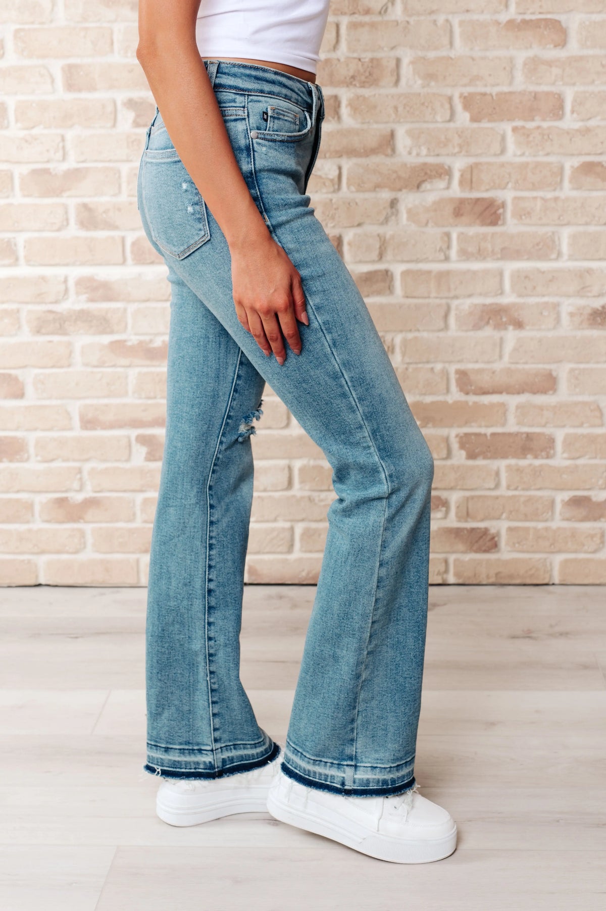 Isla Mid Rise Distressed Released Hem Bootcut Jeans - Essential Southern Charm