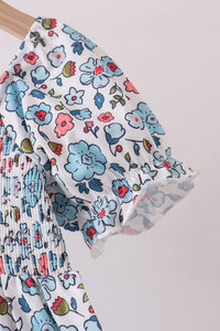 Blue floral smocked ruffle dress