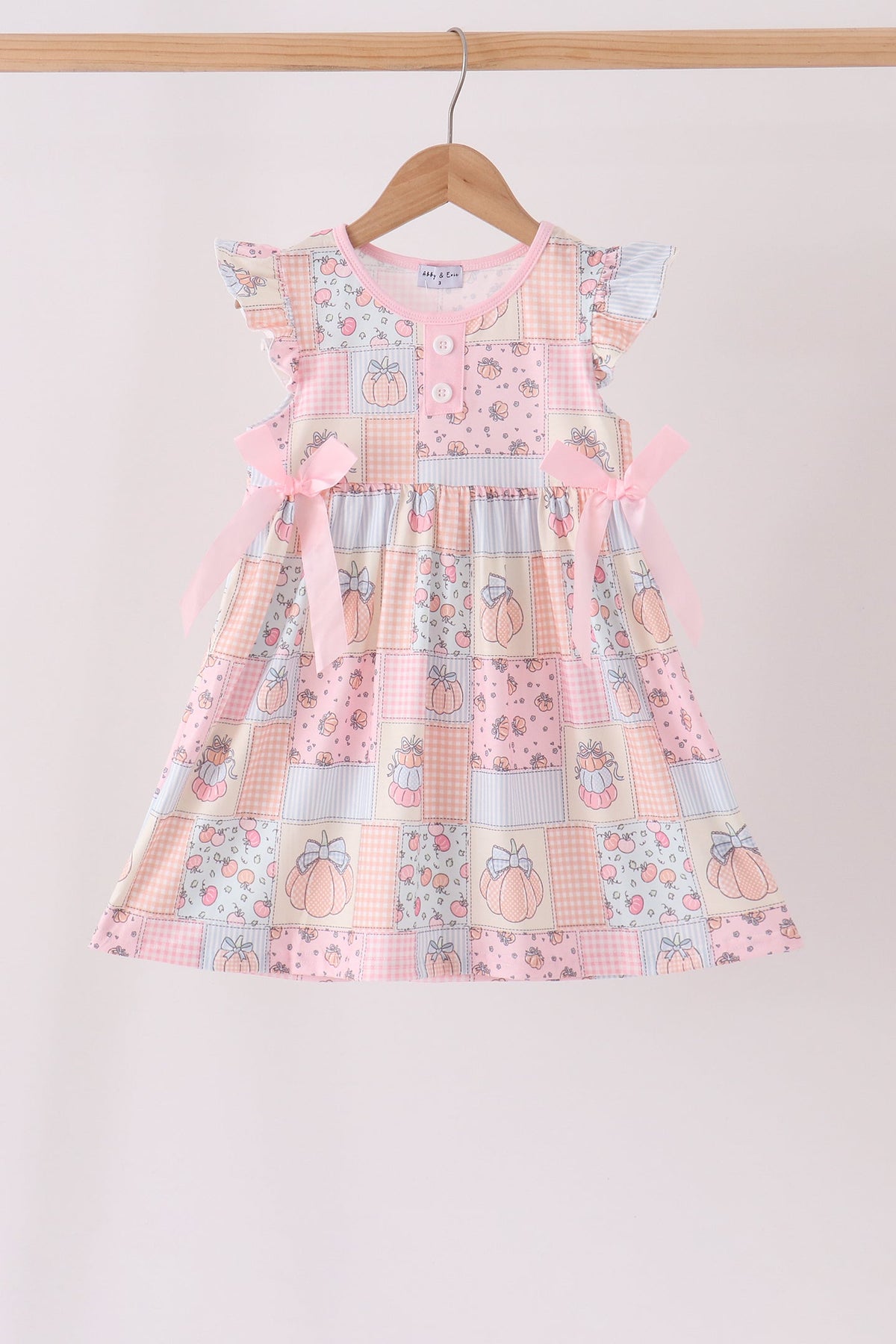 Pumpkin print ruffle dress