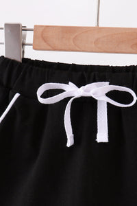 Scallop hem bow skort - Black