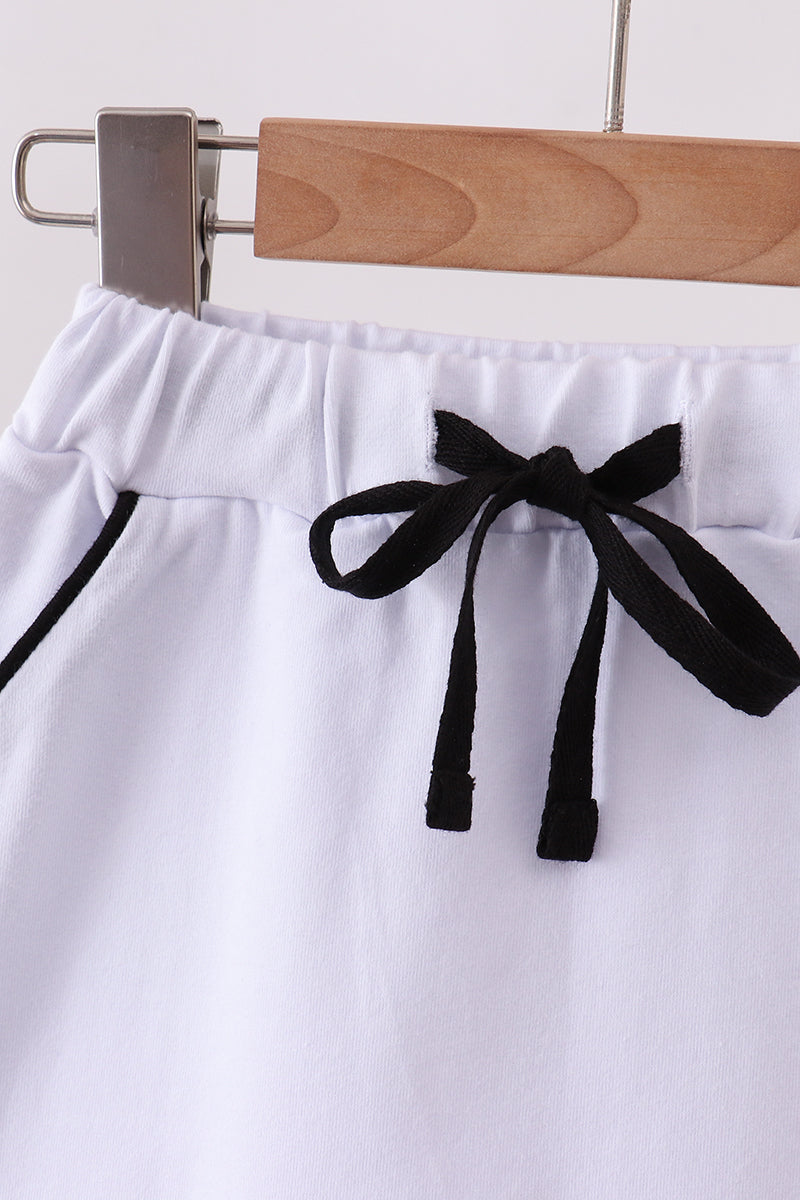 Scallop hem bow skort - White