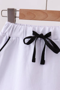 Scallop hem bow skort - White