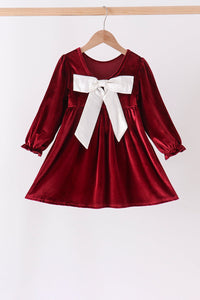 Maroon velvet bow dress