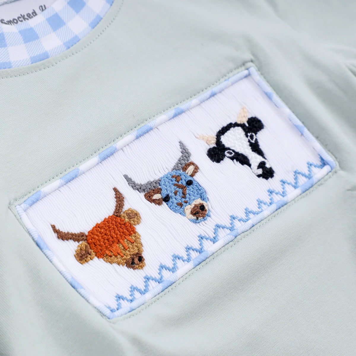 Luxe Sage Cow Hand Smocked Bubble - Essential Southern Charm