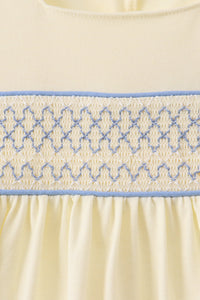 Cream smocked ruffle dress