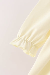 Cream smocked bow dress