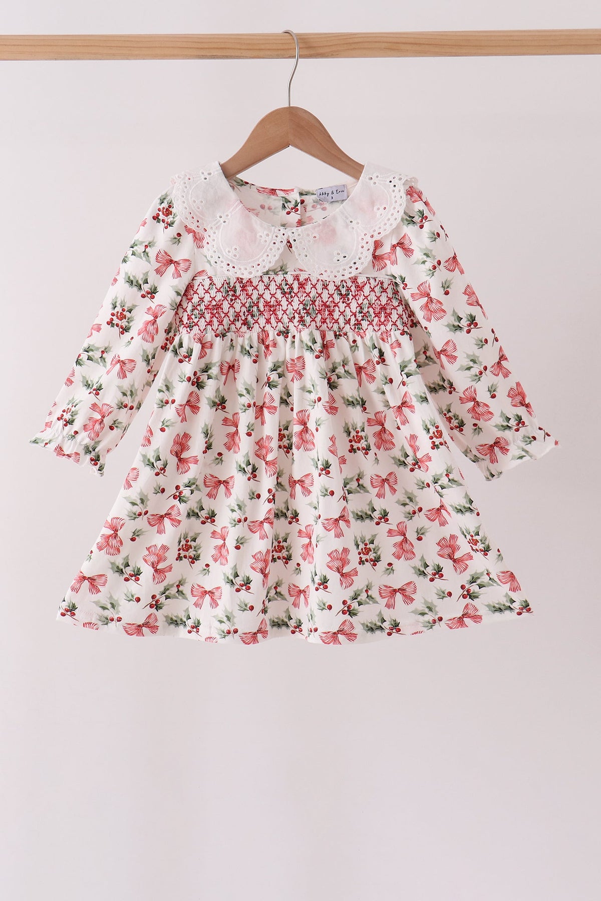 Holly Bow Smocked Lace Dress